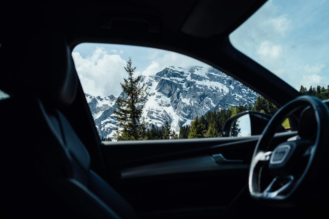 Mountain landscape with car on road
